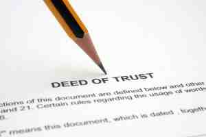 What is a promissory note secured by a deed of trust?